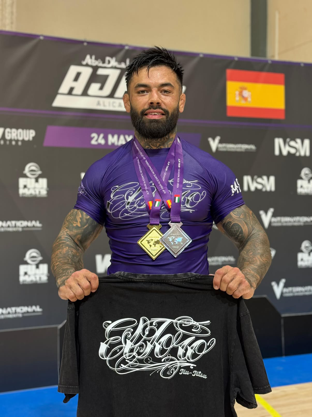 Kiki Plumb with medals won at a Jiu-Jitsu tournament