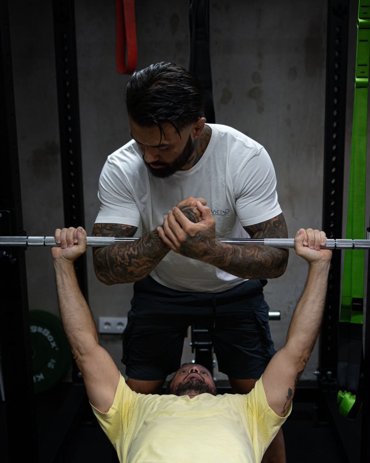 One-to-one strength coaching on the bench press